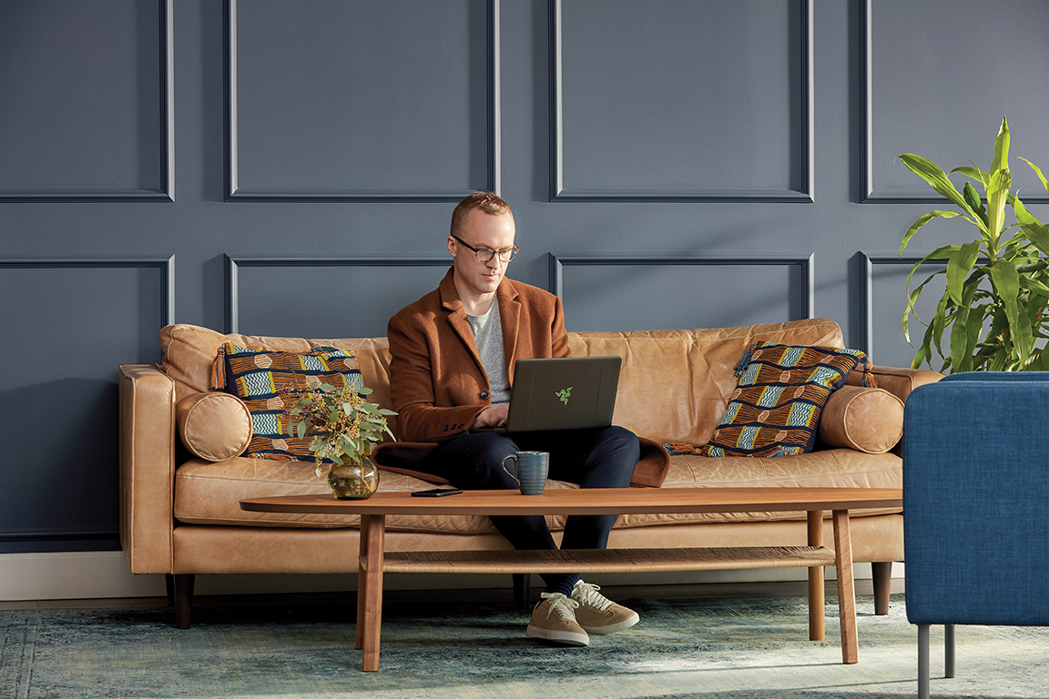 Adult male PC gaming on the go with a Razorblade at home. Mobile professional (MOPRO); Holiday 2019.