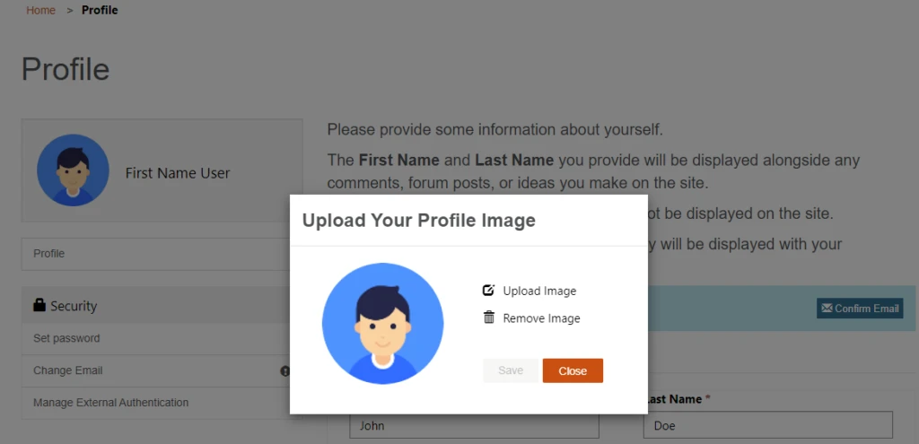 a man sitting at a desk with a computer monitor