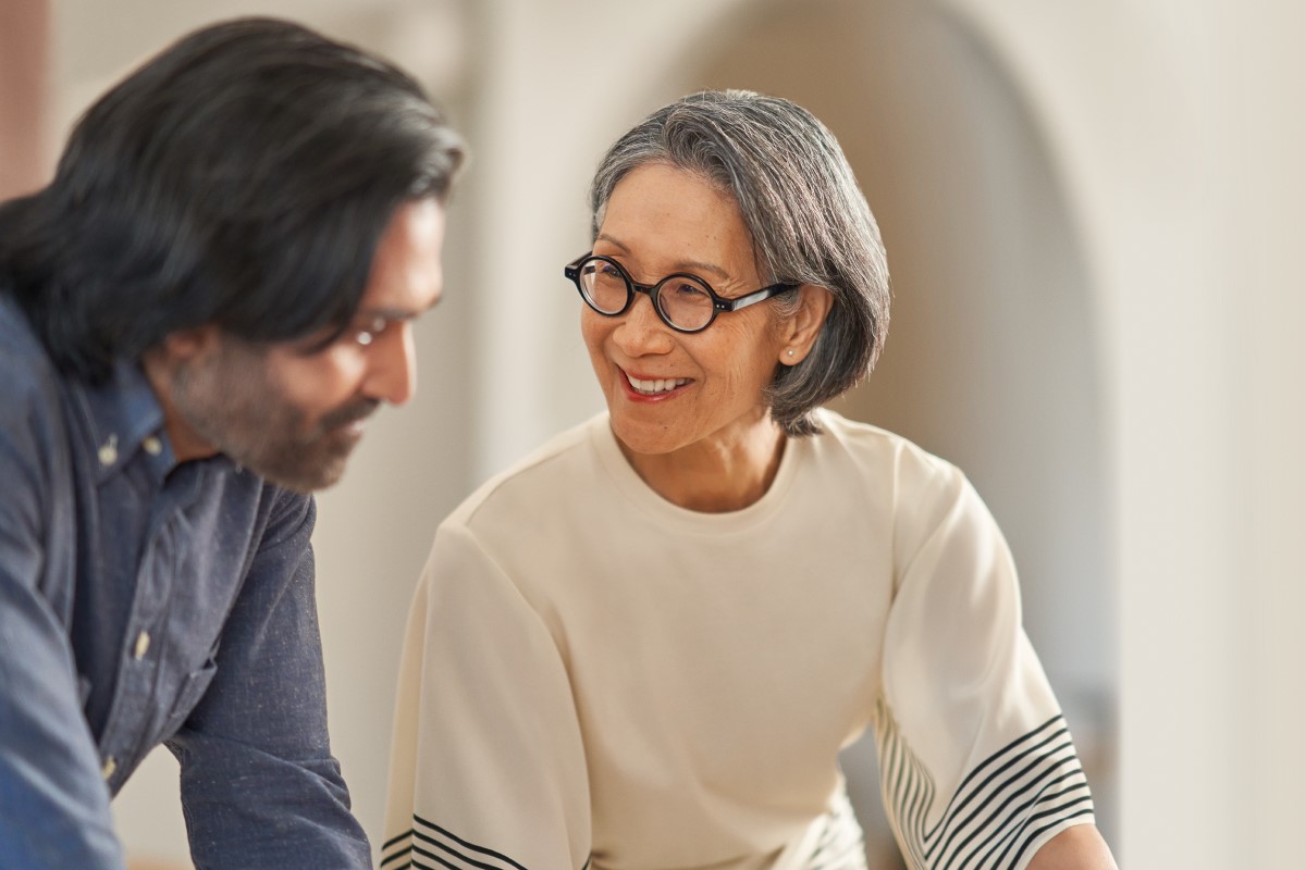 a man and a woman looking at each other