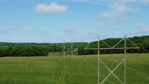 Evergy thumbnail - A field of grass with power lines