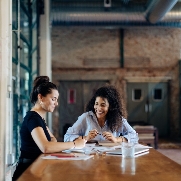 A group of women sitting at a table