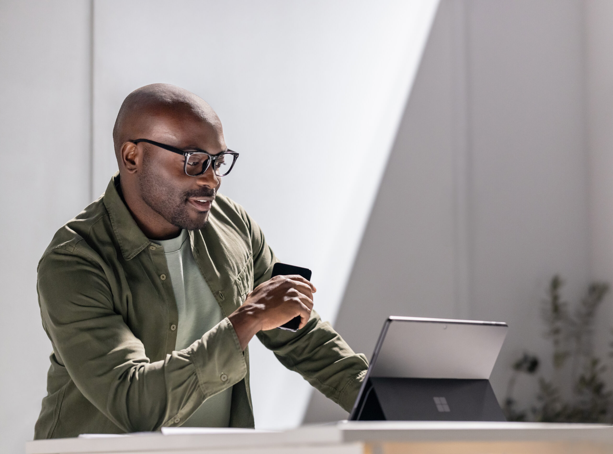 A man looking at a laptop
