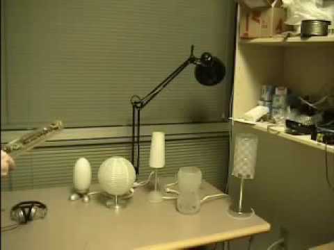 a room with a sink and a mirror