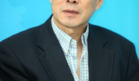 a man wearing a suit and tie