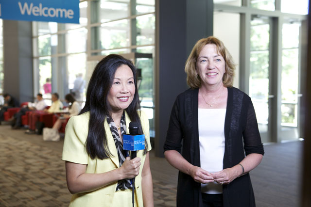 Trinh T. Minh-ha standing next to a window