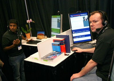 Kit Thambiratnam and Frank Seide work on The Translating! Telephone.