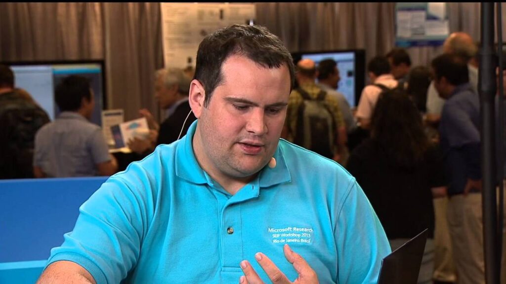 a man in a blue shirt