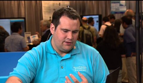 a man in a blue shirt