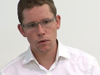 a man wearing glasses