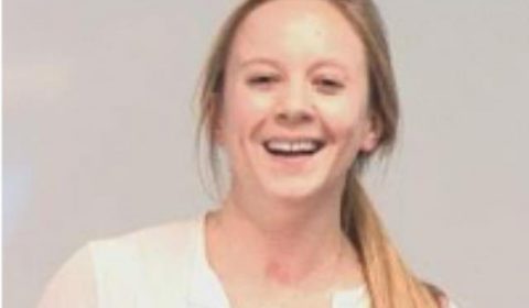 a woman smiling for the camera