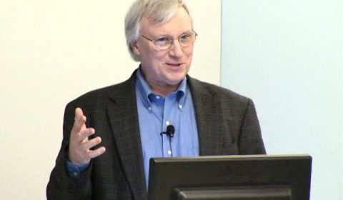 a person wearing a suit and tie