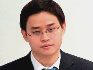 a man wearing a suit and tie