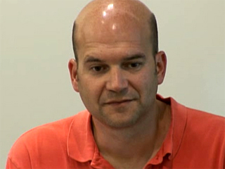 a man looking at the camera