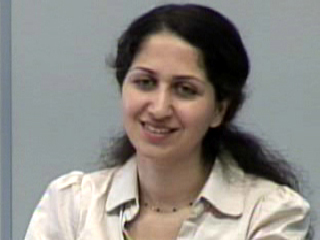 a woman smiling for the camera