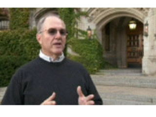 a man standing in front of a building
