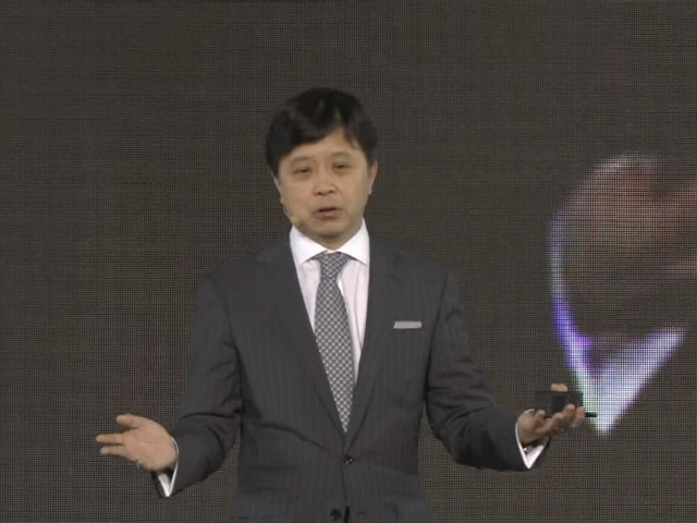 Hsiao-Wuen Hon wearing a suit and tie