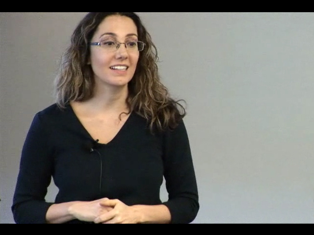 Pardis Sabeti smiling for the camera