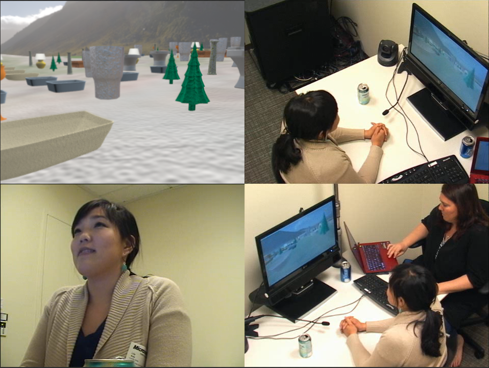 a group of people sitting at a desk in front of a laptop computer
