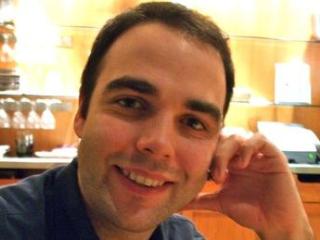 a man smiling for the camera