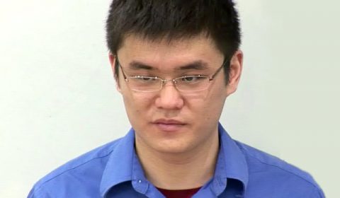 a man wearing a blue shirt