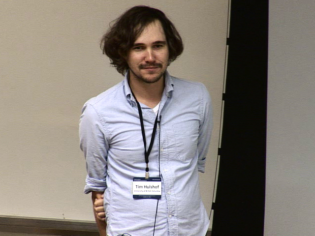 a person standing posing for the camera