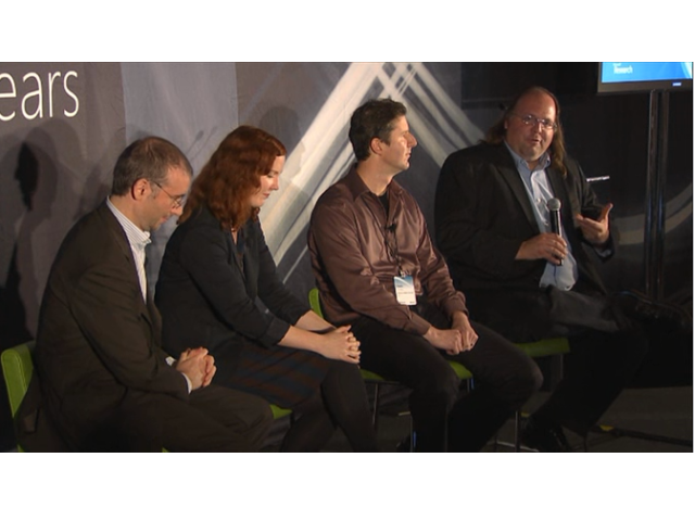 Ethan Zuckerman et al. standing in a room