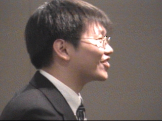 a man wearing a suit and tie