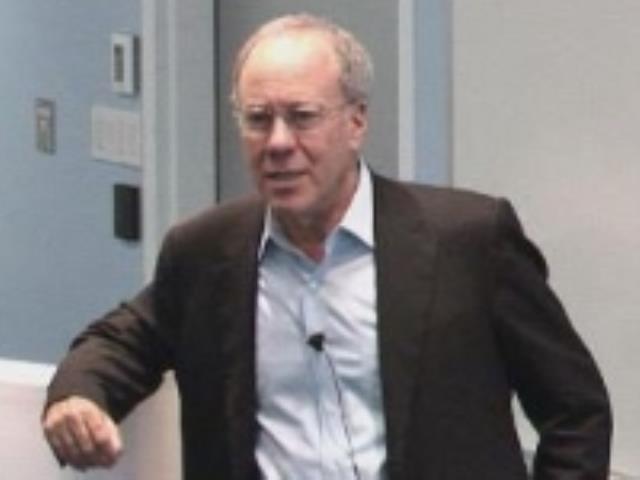 a man wearing a suit and tie