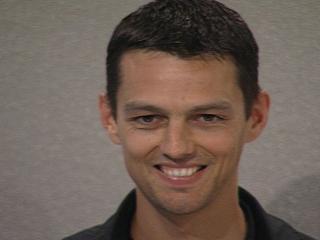 a man smiling for the camera