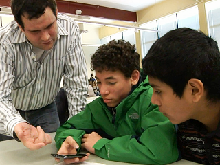 a group of people sitting at a table