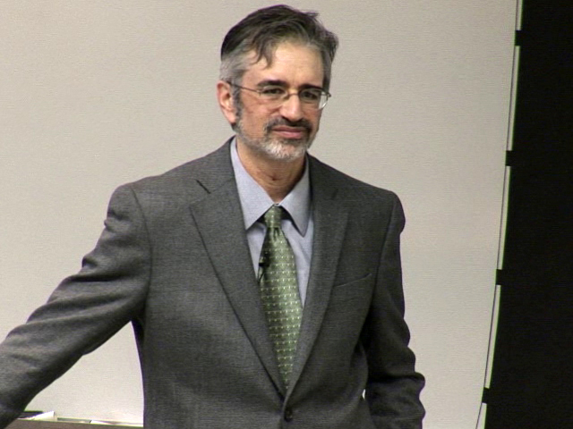 a man wearing a suit and tie