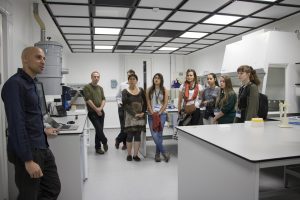 a group of people standing in a room