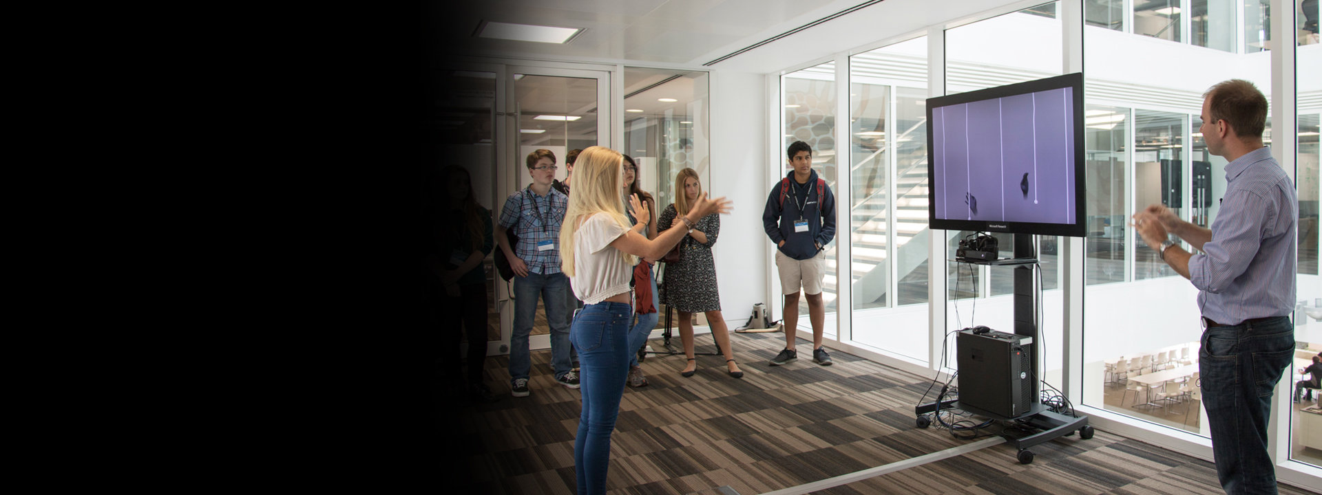 a group of people standing in a room