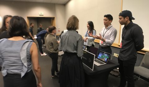 a group of people standing in a room