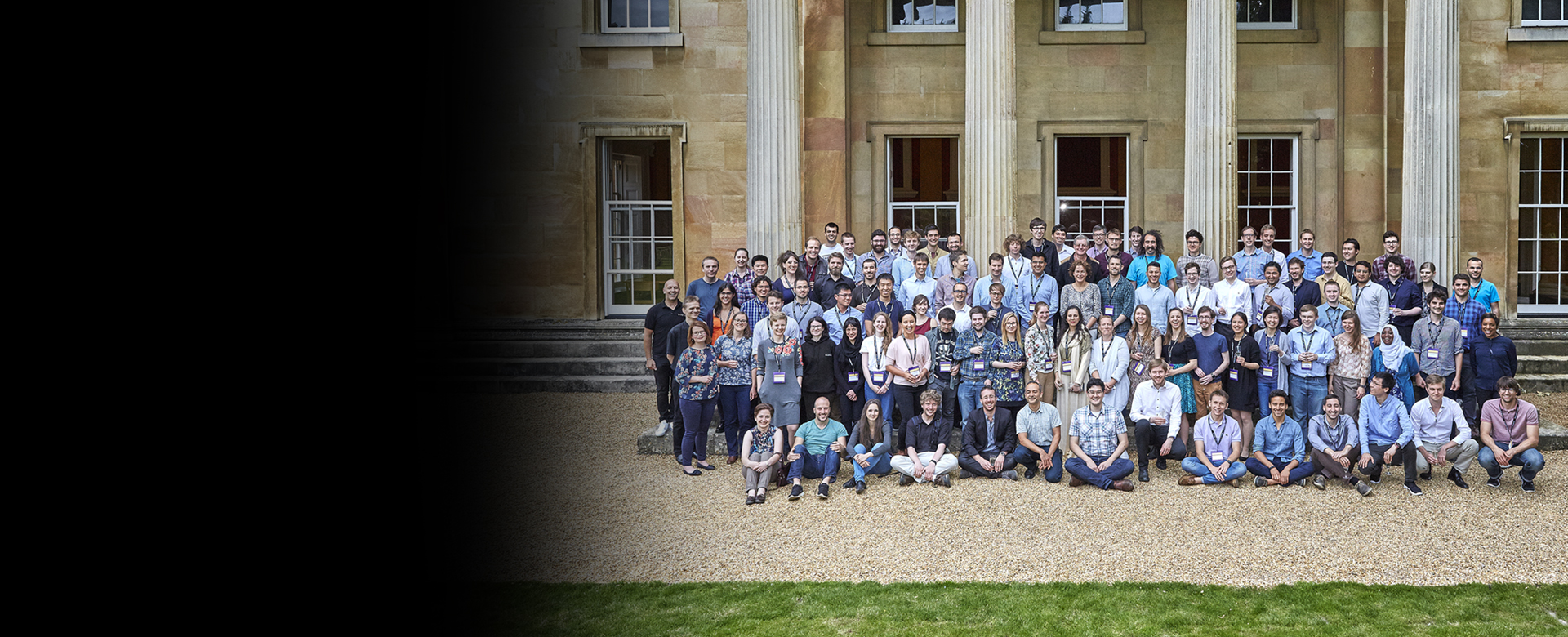 a group of people standing in front of a building