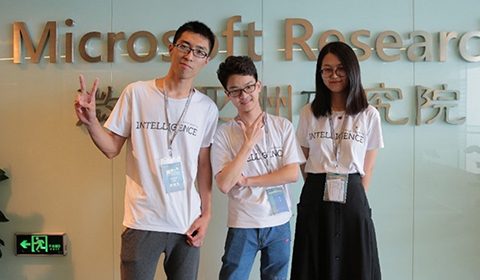 a group of people posing for the camera