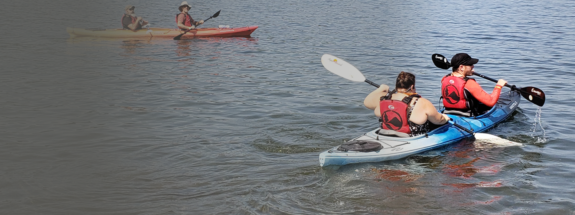 2 Kayakers on a lake using Soundscape