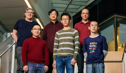 a group of people posing for a photo