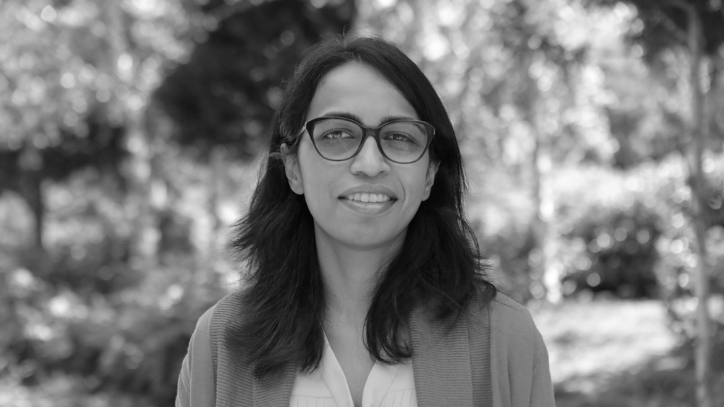 black & white photo of Dr. Shamsi Iqbal