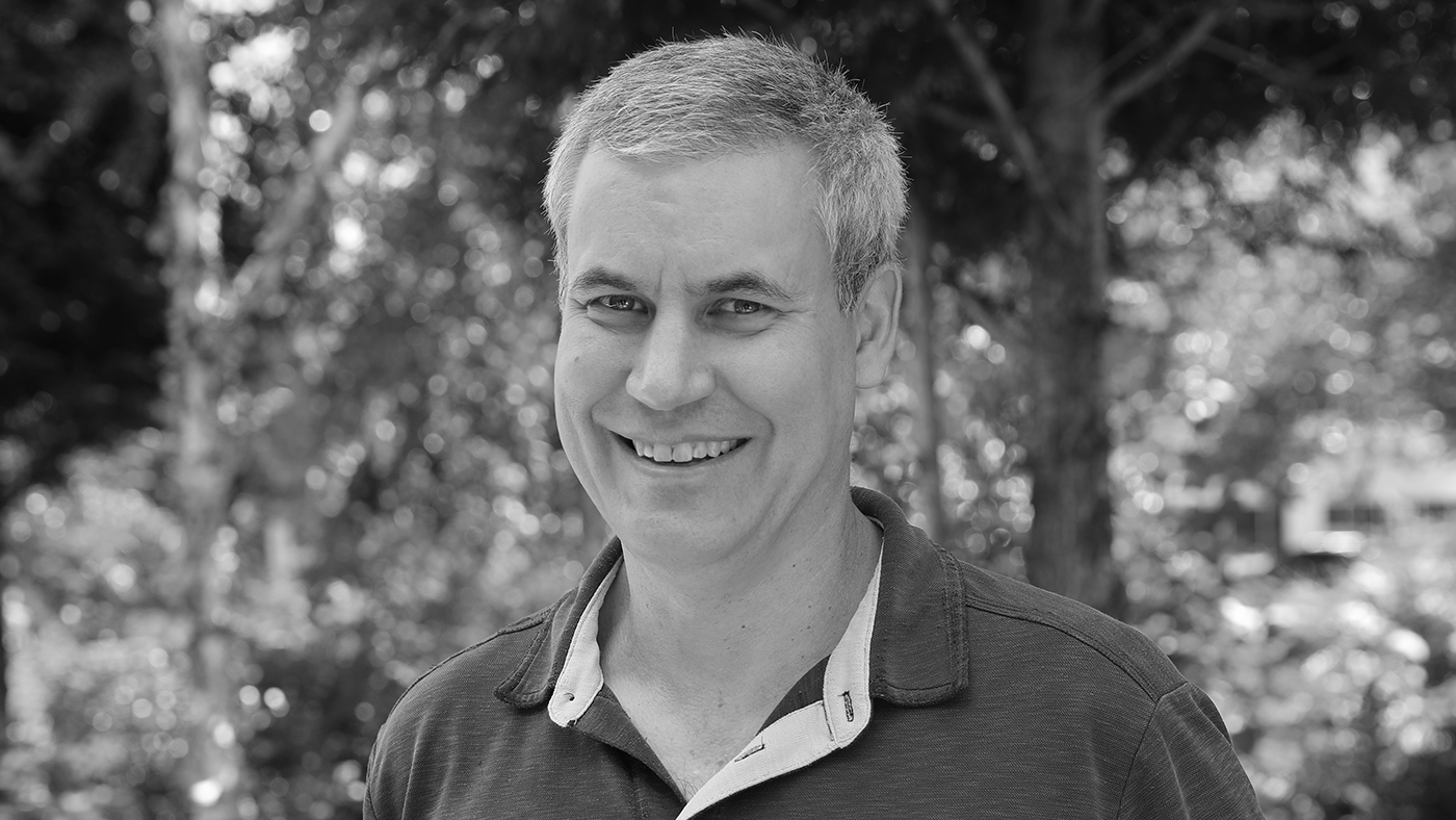 a man smiling for the camera