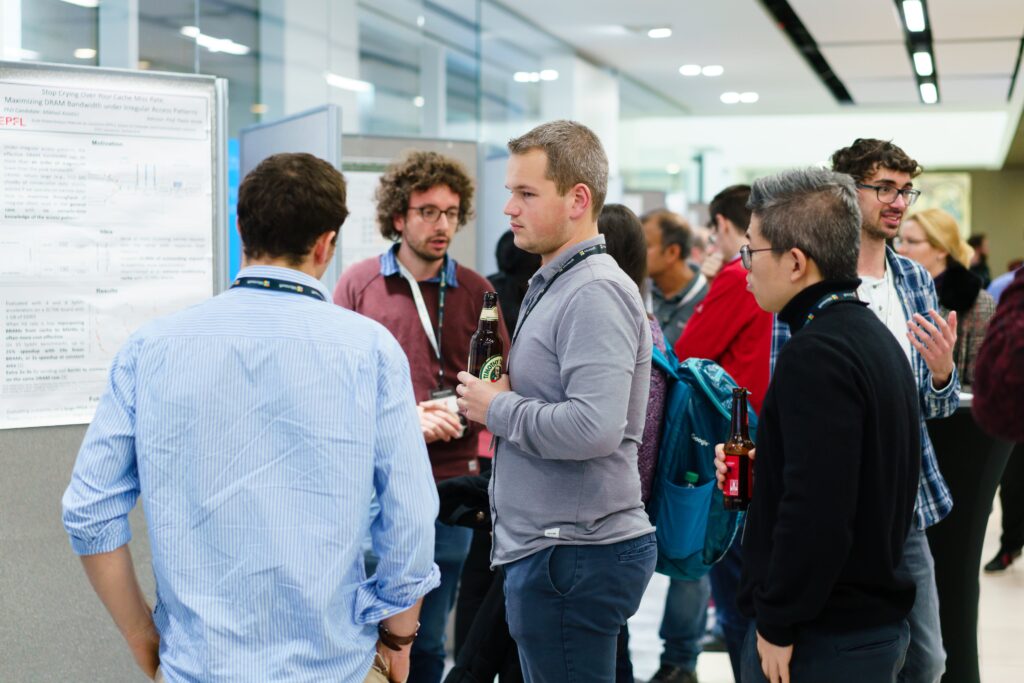 a group of people standing next to a man