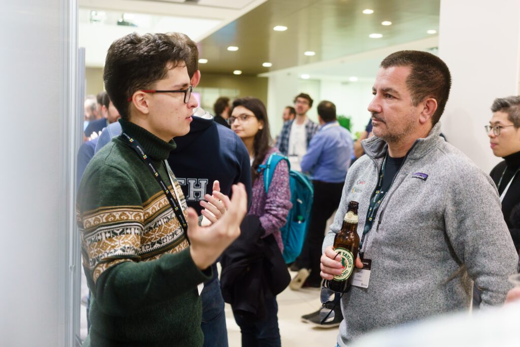 a group of people standing in a room