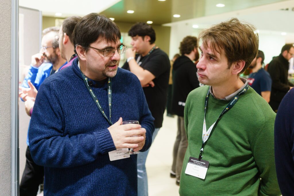 a group of people standing in a room