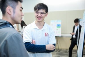 a group of people standing next to a person