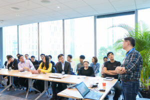 a group of people sitting at a table