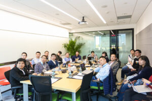 a group of people sitting at a table