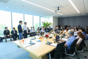 a group of people sitting at a table