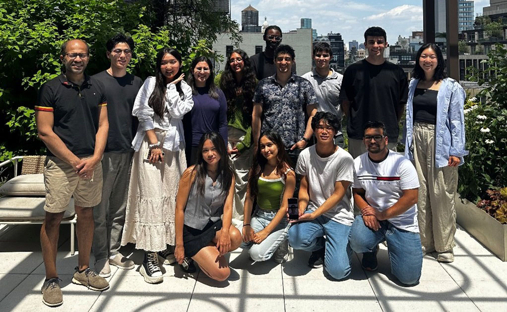 a group of people posing for a photo