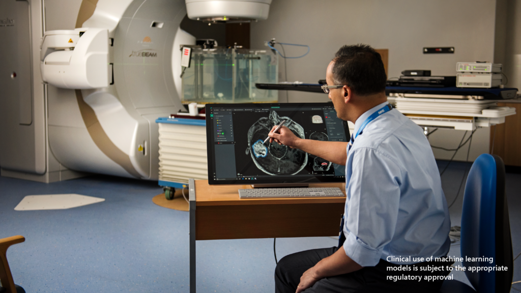 Project InnerEye: person reviewing scans on a monitor