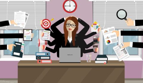 Happy business woman with many hands, multitasking.